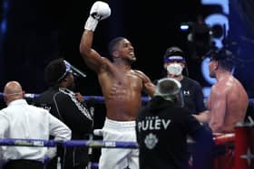 Anthony Joshua celebrates the defence of his world titles in London