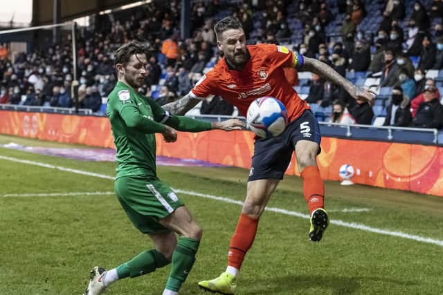 North End's Alan Browne tries to block Sonny Bradley's clearance against Luton