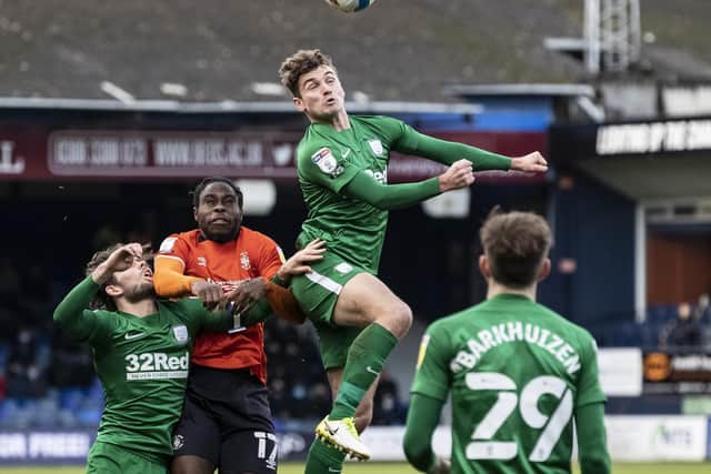 North End midfielder Ryan Ledson climbs to win a header against Luton