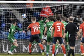 Plenty of green shirts back but Preston North End can't prevent James Collins scoring his second goal at Kenilworth Road