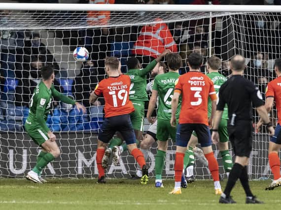 Plenty of green shirts back but Preston North End can't prevent James Collins scoring his second goal at Kenilworth Road