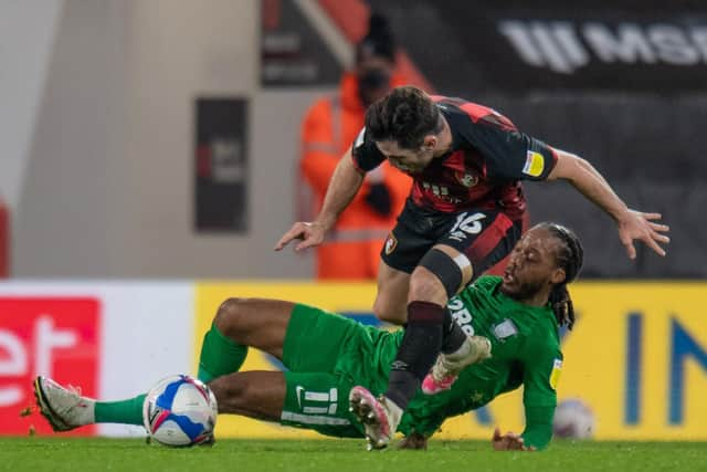 Preston North End midfielder Daniel Johnson makes a sliding tackle in the win at AFC Bournemouth