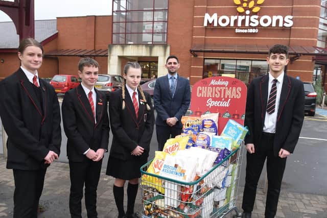 Haaris  was joined by Wellfield High headteacher  Jamue Lewis and fellow pupils for the trolley shop at Morrison's in Leyland