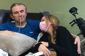 Kathryn Crichton sits beside husband David, at Chorley hospital after his bleed to the brain