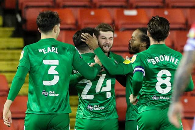 Sean Maguire is congratulated after giving PNE the lead at Barnsley