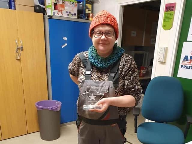 Annie with her Christmas star award, given to her by BBC North West tonight