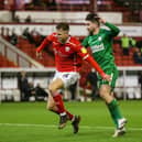 Sean Maguire challenges Barnsley's Mads Andersen