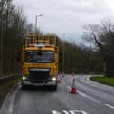 Traffic management teams at the scene where a tree came down across the A59 near Samlesbury this morning (Friday, December 18)
