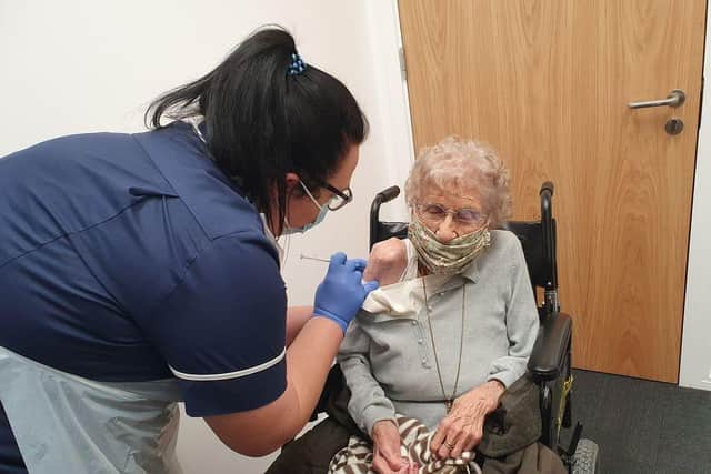 Margaret Baldwin, 104, receiving her Covid-19 vaccination this week.