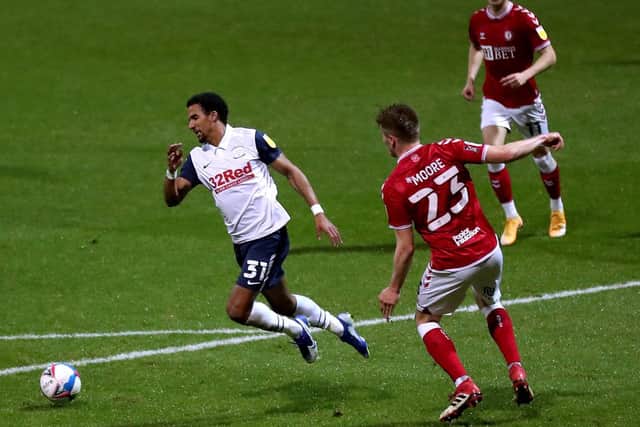 PNE winger Scott Sinclair goes down in the box after being challenged by Bristol City defender Taylor Moore