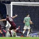 Josh Ginnelly wheels away after equalising for Hearts against Celtic at Hampden Park