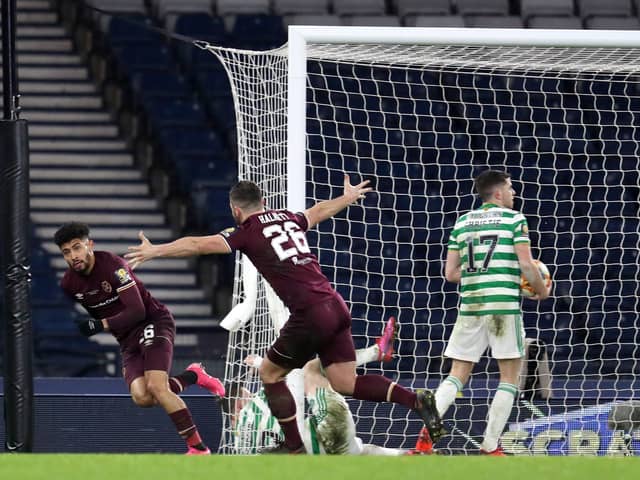 Josh Ginnelly wheels away after equalising for Hearts against Celtic at Hampden Park