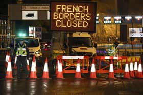 Police were turning hauliers and others away from Dover after the French decided to close their borders to UK vehicles following the emergence of a new strain of coronavirus