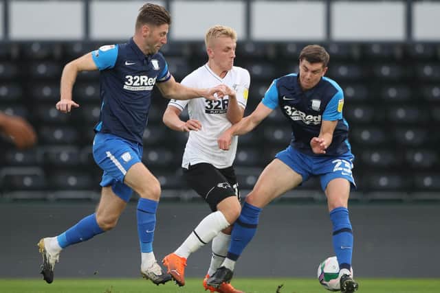 Veteran PNE midfielder Paul Gallagher (left) in action at Boxing Day opponents Derby in September in the Carabao Cup