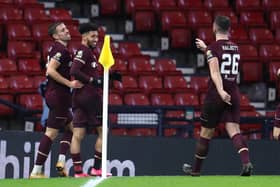 Josh Ginnelly (centre) was on target for Hearts in the Scottish Cup final against Celtic