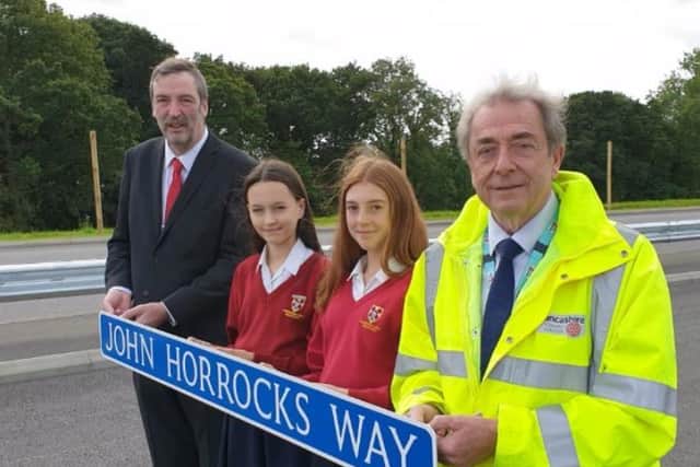 John Horrocks Way was opened last December. Coun Keith Iddon (right) is with South Ribble cabinet member Coun William Evans and schoolgirls Grace Shields and Laura Gillett, who won a competition to name the new road.