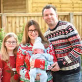 Crystal King with daughter Ella, nine, and partner Tim Holloway, were overjoyed to bring home 'miracle baby' Theo after years of infertility heartache and IVF treatment. Photo: Daniel Martino for JPI Media.