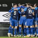 The Preston North End players celebrate Alan Browne's late winner against Derby County at Pride Park