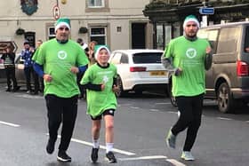 Freddie Xavi running on Christmas Day.  Picture by Daria Neklesa