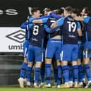 Preston players celebrate Alan Browne's last-ditch winner