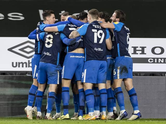 Preston players celebrate Alan Browne's last-ditch winner