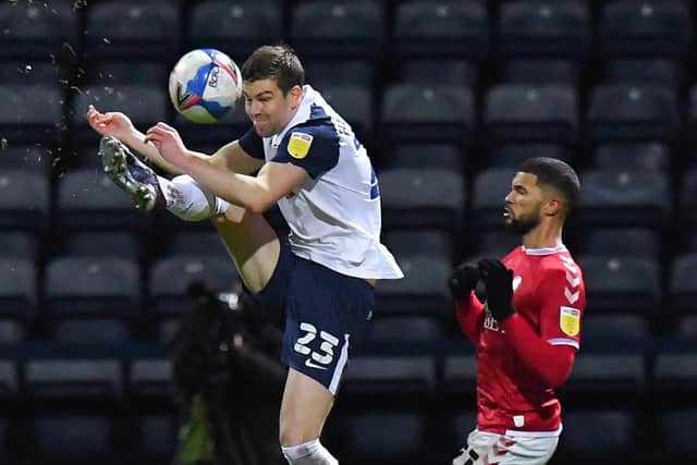PNE defender Paul Huntington takes the ball away from Bristol City striker Nahki Wells
