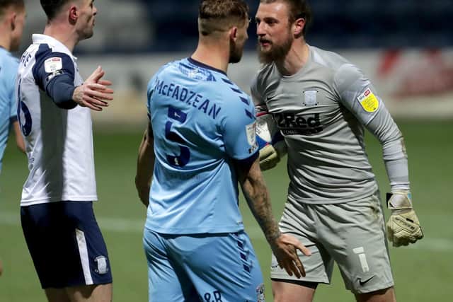 PNE goalkeeper Declan Rudd has an exchange of views with Coventry skipper Kyle McFadzean