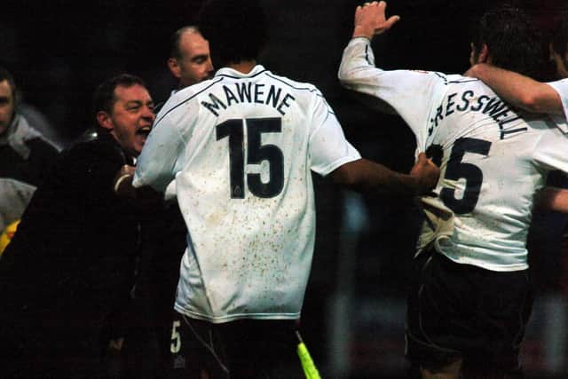 PNE boss Billy Davies and defender Youl Mawene join in with Richard Cresswell's hat-trick celebrations