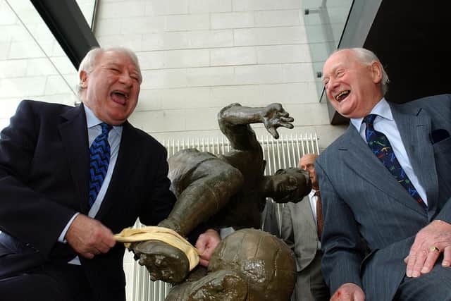 Tommy Docherty (left) with his great friend Sir Tom Finney