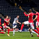 Preston North End defender Ben Davies curls a shot against the bar in the defeat to Nottingham Forest at Deepdale