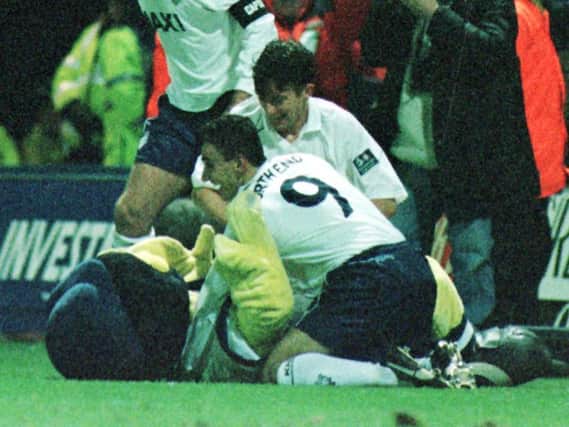 Deepdale Duck joins in with Preston North End's goal celebrations against Arsenal in January 1999 at Deepdale