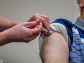 GPs and local vaccination services have been asked to give injections to every care home resident in their area by the end of January