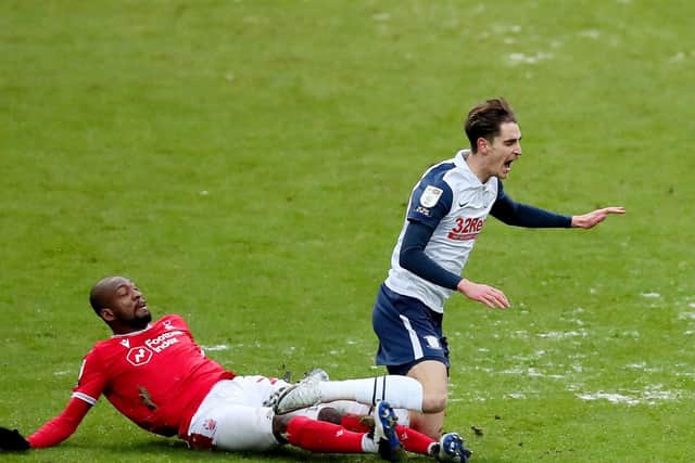 Tom Bayliss is challenged by Nottingham Forest midfielder Samba Sow at Deepdale