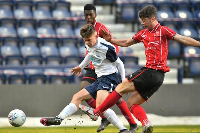 PNE midfielder Lewis Leigh in the thick of the action