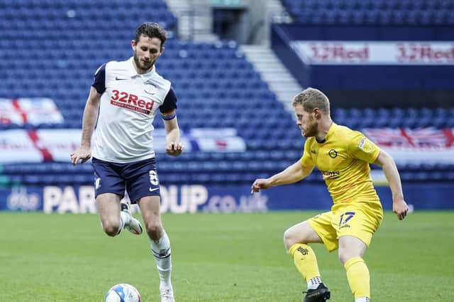 Preston skipper Alan Browne takes on former PNE winger Daryl Horgan in December's game against Wycombe at Deepdale