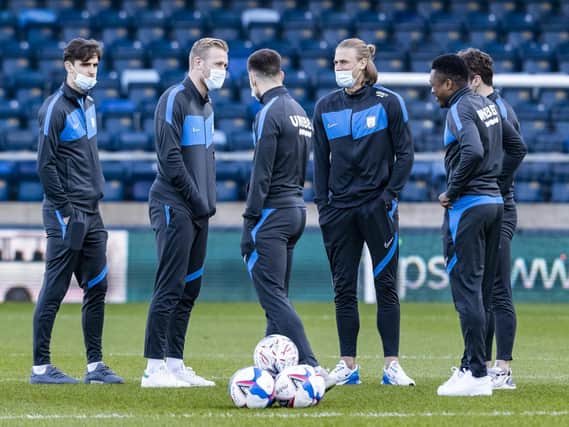 Preston North End players on the pitch at Adams Park ahead of the FA Cup clash with Wycombe Wanders