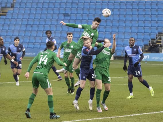Andrew Hughes is up to head during the defeat.