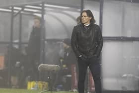 Wycombe Wanderers manager Gareth Ainsworth watches his side's FA Cup win over Preston North End from the technical area