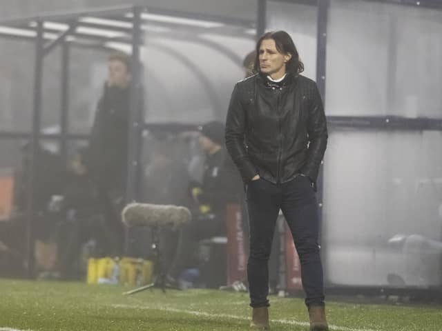 Wycombe Wanderers manager Gareth Ainsworth watches his side's FA Cup win over Preston North End from the technical area