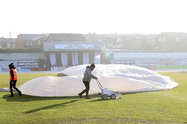 Chorley groundsman Ben Kay preparing the pitch on Saturday morning