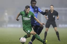 Preston North End's new boy Jayson Molumby breaks away from Wycombe Wanderers' Admiral Muskwe