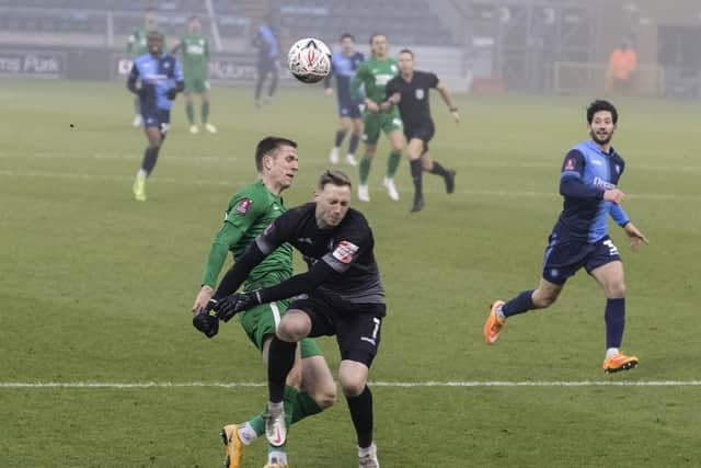 Emil Riis wins PNE's penalty after being fouled by Wycombe goalkeeper Ryan Allsop