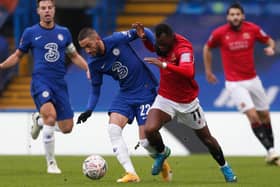 Carlos Mendes-Gomes battles for possession with Chelsea's Hakim Ziyech   Picture: Getty Images