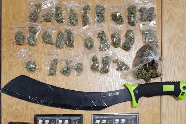 A search of the Samuel Street flats' communal areas led to officers discovering 27 bags of cannabis and scales associated with drug dealing. Police also found a kitchen knife and a large machete during their sweep of the corridors.