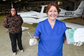 Hangar 3 at Blackpool Airport have introduced coronavirus testing for passengers.  Pictured is tecnician Louise Johnston with general manager Victoria English (left)