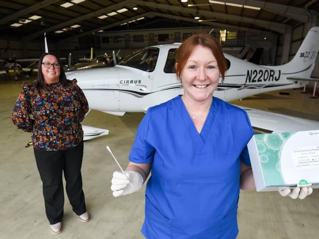 Hangar 3 at Blackpool Airport have introduced coronavirus testing for passengers.  Pictured is tecnician Louise Johnston with general manager Victoria English (left)