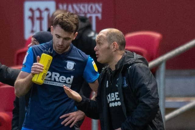 Ben Whiteman takes some instructions from PNE boss Alex Neil