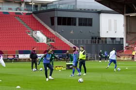 The Preston players warming up before the game.
