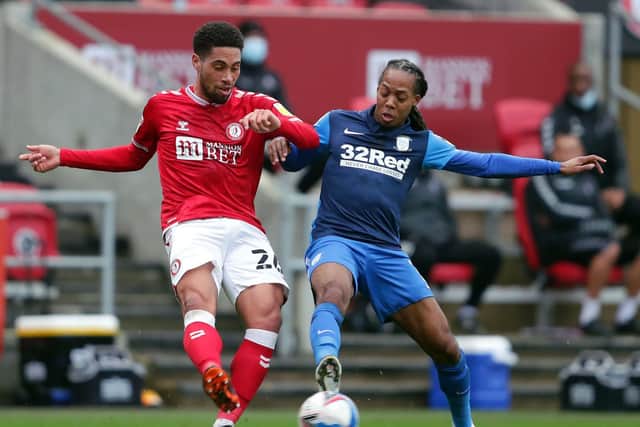 Daniel Johnson and Zak Vyner complete during PNE's defeat at Bristol City