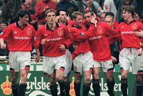 United celebrate Eric Cantona's late FA Cup final winner in 1996